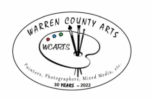 Warren County ARTS logo, painter palette with brushes